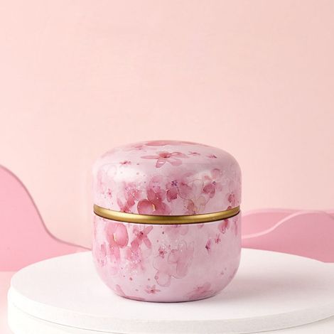 Boîte à thé ronde métal vintage rose