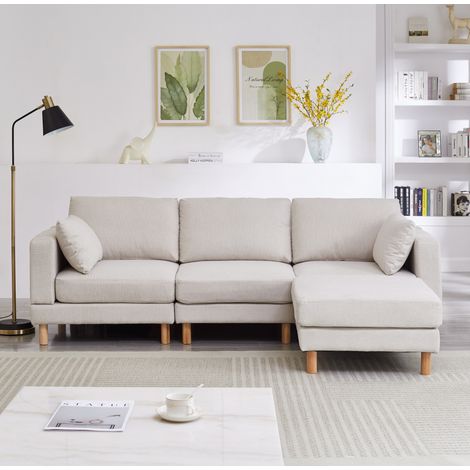 Canapé d’angle 3 places en tissu polyester beige avec pouf, angle réversible (1/5)