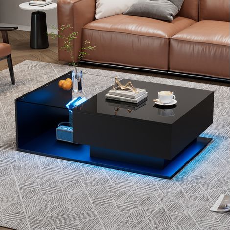 Table basse 100x50x32 cm noire en panneaux de particules avec plateau brillant, verre, tiroir et éclairage LED (1/5)
