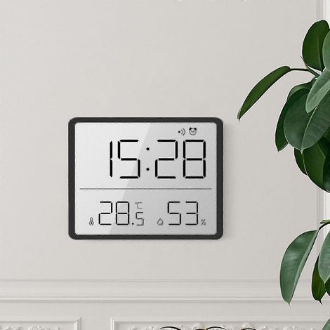 Cette horloge numérique ultra-mince à écran LCD est dotée d'un dos magnétique, ce qui permet de la fixer au mur ou au réfrigérateur. Elle intègre également un capteur de température et d'humidité. (1/5)