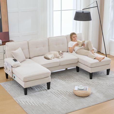 Grand canapé d'angle 4 places en lin doux, dossier moderne, avec deux méridiennes, pieds robustes et coussins d'assise confortables agrémentés de coussins décoratifs – élégant pour tout salon. Beige (1/5)