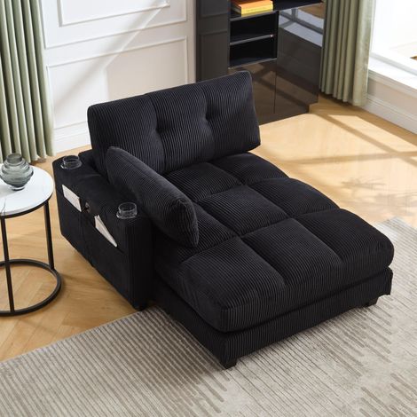 Divano in velluto a coste nero, regolabile in 4 posizioni, con portabicchieri, tasche laterali e porte USB/Type-C, comodo e pratico per il soggiorno.