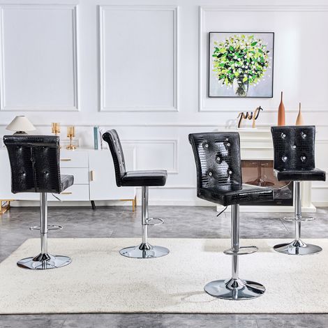 Lot de 4 fauteuils vintage cuir crocodile noir avec fermoir cristal. Finition simili cuir raffinée pour sublimer la salle à manger. (1/5)