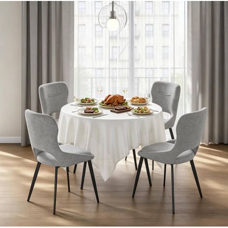 Set de 4 sillas de comedor tapizadas en cinilla gris con estructura de metal (1/5)