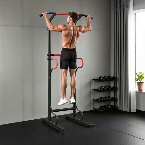Station de dips à hauteur réglable avec barre de traction et ventouses – une salle de sport à domicile. (1/5)