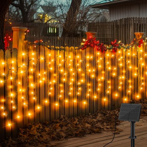 Lumières Solaire pour Rideau D'extérieur Jardin, 4Mx1M 200 LEDs Solar Lumière de Glaçon, 8 Modes IP65 Étanche Guirlandes Lumineuses à Fil Vert pour Patio Gazebo Clôture Noël Décor (Blanc Chaud) (1/5)