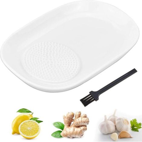 Grattugia in ceramica per zenzero e aglio: un pratico aiuto in cucina per verdure e spezie. (1/5)