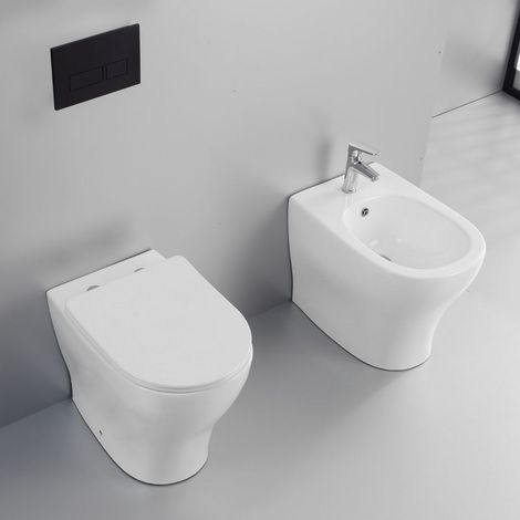 Coppia sanitari fun a pavimento vaso e bidet sedile frizionato (1/5)
