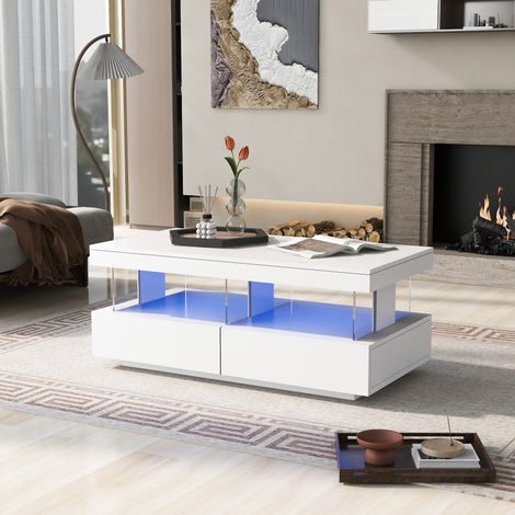 Table basse 100x60x49,5 cm haute brillance,lisse et résistante aux rayures. Durable et design,idéale pour le salon et un usage intensif.