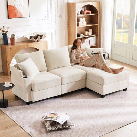 Canapé d'angle en L convertible 3 places avec repose-pieds, porte-gobelet, chargeur USB, rangement dans l'accoudoir et 2 coussins, idéal pour salon, bureau ou appartement, beige (1/5)