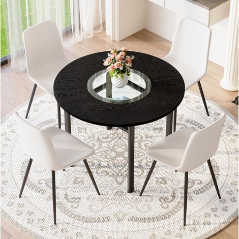 Set da pranzo con tavolo rotondo in MDF e metallo nero 100x100x76 cm, inserto in vetro, 4 sedie in PU bianco (1/5)
