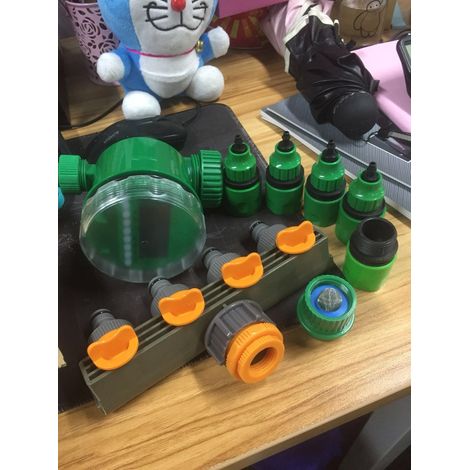 Kit de temporizador de riego para jardín de 7 piezas con conector rápido y divisor de manguera de 4 vías.