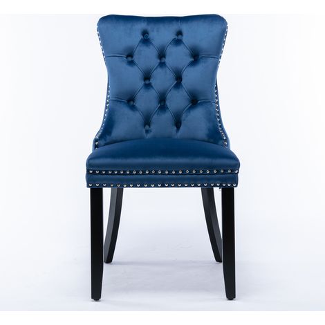 Collection Nikki : 2 chaises de salle à manger haut de gamme velours,bois massif touffé,pieds bois,cloutées,couleur bleue.