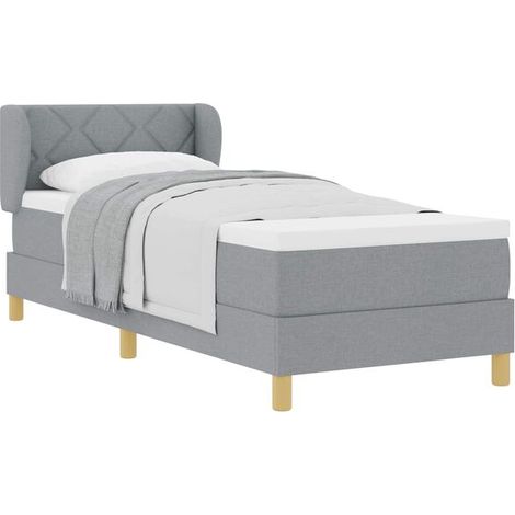 Matelas à ressorts avec matelas gris clair, mesurant 80 x 200 cm, recouvert de tissu. (1/5)