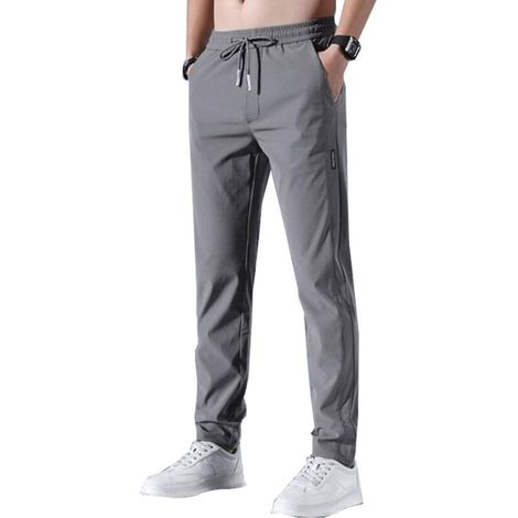 Pantalon de sport pour homme, séchage rapide et extensible, respirant et idéal pour la course à pied et le jogging. Cordon de serrage et poches inclus. Taille 2XL, gris foncé. (1/5)