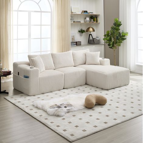Canapé con chaise longue modular de pana beige 257x90-160x62 cm, con 5 cojines, portavasos y bolsillos laterales (1/5)