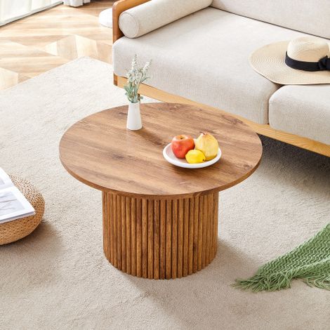 Table basse ronde en MDF de 70 cm de diamètre : inspirée des colonnes romaines, avec une structure métallique intégrée et un style rétro chic pour le salon. Idéale pour les intérieurs européens. (1/5)