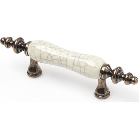 Asa en porcelana cuero, dimensiones: 125x18x30mm, entrepuntos: 64mm -