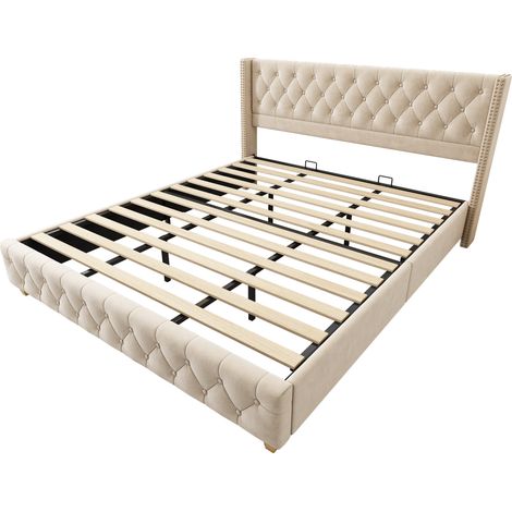 Lit rembourré 180200 cm avec sommier à lattes et tête de lit, capitonnage à boutons, ornements à clous, pieds en bois, velours, beige clair (1/5)