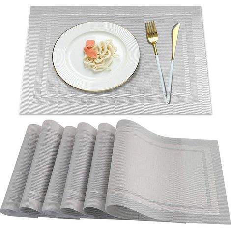 Ein Set aus 6 Platzsets, waschbar, fleckenabweisend, hitzebeständig, geeignet für Küchen, Wohnungen, Esszimmer und Esstische, in Grau.