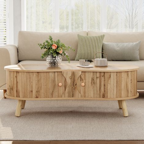 Table basse en forme de haricot avec effet rainuré, 2 portes coulissantes, table de salon effet bois, pieds en bois massif, matériau MDF