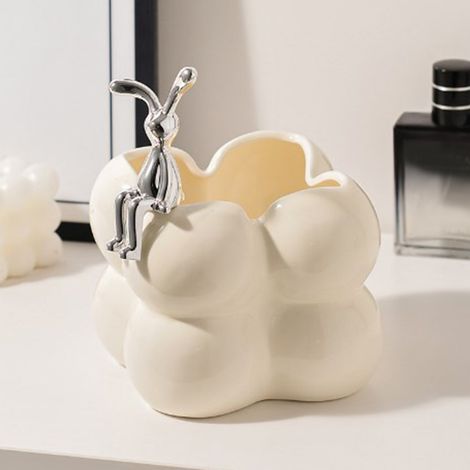 Boîte de rangement en céramique beige moderne et raffinée en forme de lapin, idéale pour ranger cosmétiques, clés et autres objets de décoration. (1/5)