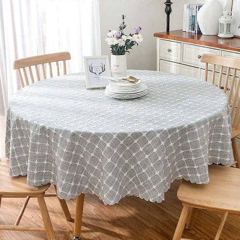 Moderne und minimalistische runde Tischdecke aus Baumwolle und Leinen, bestickt mit Kreuzstich. Große runde Tischdecke.