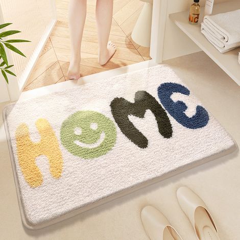 Tapis en microfibre beige, antidérapant, doux et absorbant — (1/5)