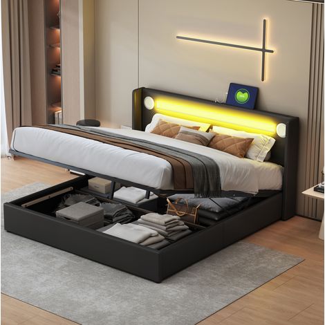 Cama tapizada 160/200 cm negra de PU y metal con LED, Bluetooth y arcón (1/5)