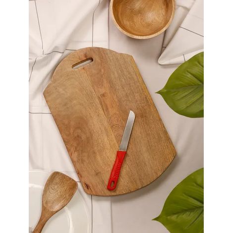 Planche à découper artisanale en bois exotique de manguier pour légumes (1/2)
