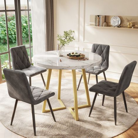 Table à manger ronde blanche effet marbre avec structure métallique dorée, design moderne pour cuisine et salon (1/5)