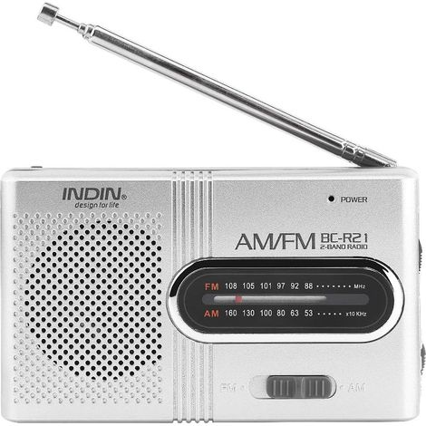Mini radio portable AM/FM avec antenne télescopique, haut-parleur stéréo et prise casque. Son format compact facilite le transport et permet une écoute pratique de la musique et des stations radio. (1/5)