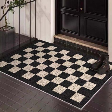 LAN Fußmatte mit schwarz-weißem Karomuster, 4060 cm (Seidenschlinge). Fleckenabweisende und pflegeleichte Fußmatte aus Seidenschlinge mit rutschfester Oberfläche. (1/5)