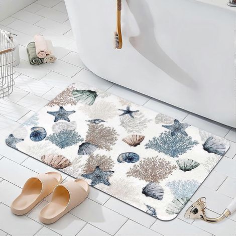 Tapis de bain à motif océanique avec étoiles de mer, coraux et coquillages absorbant, antidérapant et lavable bleu (1/5)