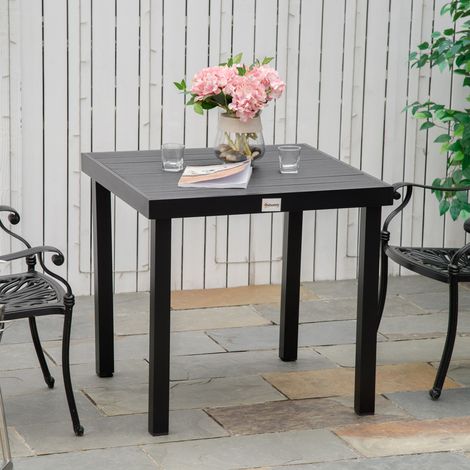 Table de jardin en aluminium noir carrée avec plateau effet bois, pieds réglables et antidérapants (1/5)