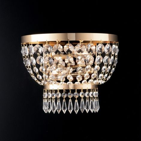 Aplique imperial de hierro y latón dorado con dos luces 27x h22 cm