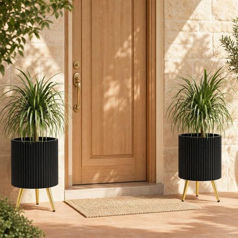 Évitez l'eau stagnante avec ce pot de fleurs rond en métal, sur 3 pieds, antirouille, pour terrasse ou salon (1/5)