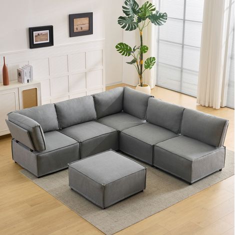 Divano modulare angolare in tessuto grigio chiaro, componibile e trasformabile in letto (1/5)
