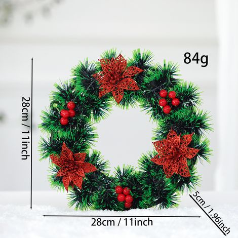 Couronne décorative artificielle - fleurs roses pailletées, baies rouges, branches de pin - 28 cm