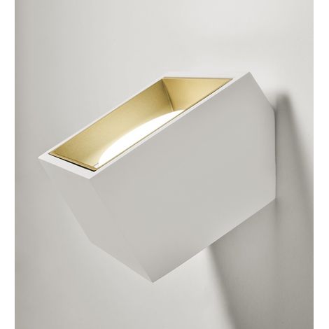 TECNICO Lampada da parete in gesso per illuminazione indiretta. Elemento in alluminio con finitura ottone spazzolato. Dotata di portalampada GX53