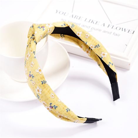 Accessoire de coiffure pour femme : serre-tête rond à pois et nœud croisé en tissu (jaune) (1/2)