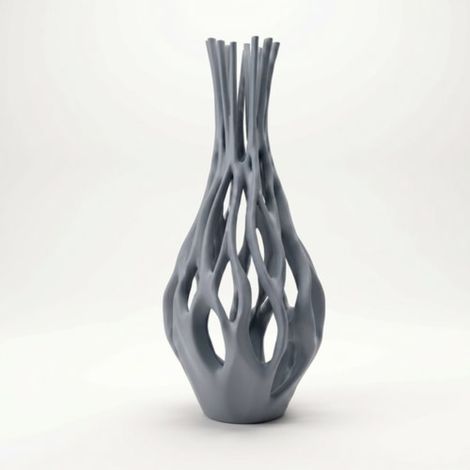 Vaso decorativo grigio traforato per fiori, con elegante effetto ragnatela. (1/3)