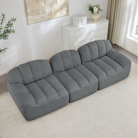 Sofá modular 288/104/79 cm en gris, sin estructura, con tapizado suave y otomana (1/5)