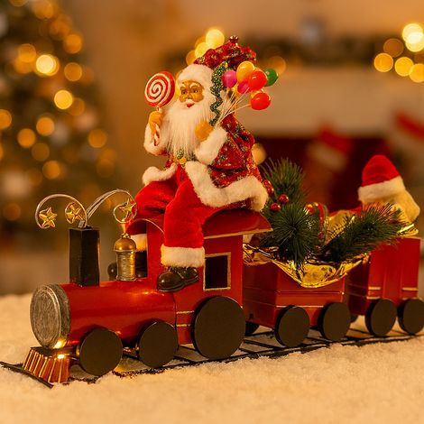 Treno natalizio in metallo con Babbo Natale e orsetto integrato di luce e musica (1/4)