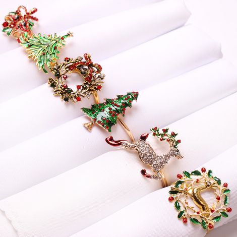 6 ronds de serviette décorés de fleurs d'élan et de motifs de sapin de Noël, (1/5)