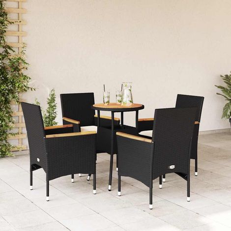 Ensemble repas de jardin 1 table et 4 chaises en résine tressée noir, plateau acacia, coussins - PANGIVO (1/5)