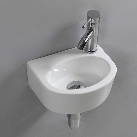 Ovales, wandhängendes Keramikwaschbecken für kleine Badezimmer. (1/5)