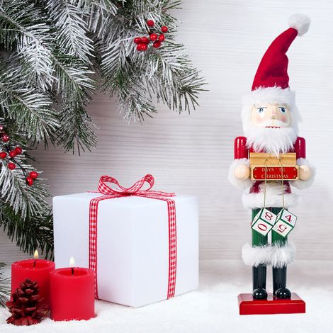 Weihnachtsmann, Schneemann, Nussknacker, Holzfigur, Nussknacker-Soldat, traditionelle festliche Tischdekoration (1/5)