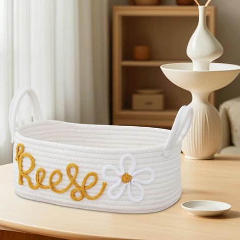 Cesta tejida personalizable para juguetes, ropa o pañales de bebé, ideal como regalo. (1/4)