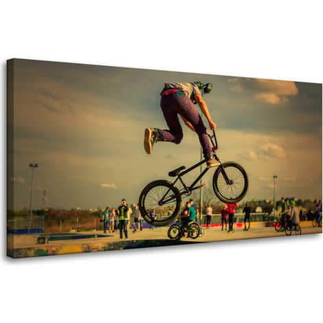 Leinwanddruck „Jugendliche Fahrradakrobatik“ 80x40